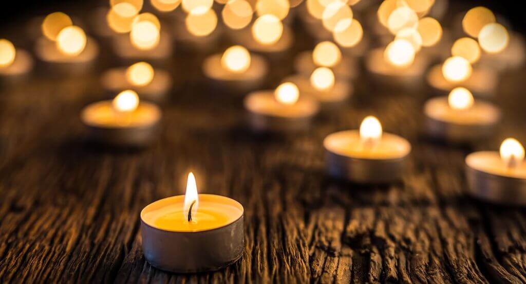 Candles on a wooden plank image