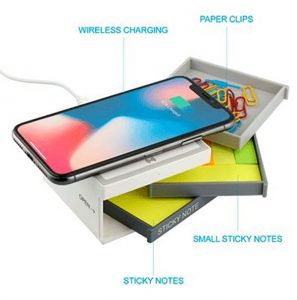 Chaos desk kit with charging pad wirelessly charges your phone, holds two sizes of sticky notes, and has a small drawer for other office needs
